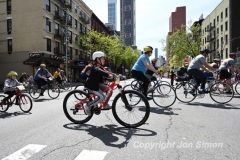 The annual NYC Five Boro Bike Tour exits the FDR Drive and passes through the Upper East Side of Manhattan as it heads to Queens 5/1/22.   Always held on the first Sunday of May, the 40 mile tour has over 30,000 participants. Copyright Jon Simon