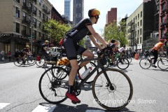The annual NYC Five Boro Bike Tour exits the FDR Drive and passes through the Upper East Side of Manhattan as it heads to Queens 5/1/22.   Always held on the first Sunday of May, the 40 mile tour has over 30,000 participants. Copyright Jon Simon