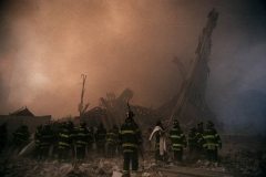 911 55
20010911AE 1/* While on Church St. in front of where the towers stood, some of the first FDNY firefighters to arrive stand looking over the rubble. The World Trade Center in New York, NY, is attacked when 2 planes are hijacked by terrorists and flown into the two towers thus causing them to fall.  Photographed on 9/11/2001 in New York, NY. Photo by Aristide Economopoulos / The Star-Ledger  
    WTC 9/11 September 11th terror attack