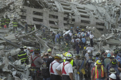 September 13, 2001--World Trade Center--Firefighters and rescue workers search for survivors through the rubble of the destroyed World Trade Center after terrorist attacks two days earlier on Tuesday September 11, 2001. (©2001 Kevin P. Coughlin/Independent Photojournalist)