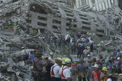 September 13, 2001--World Trade Center--Firefighters and rescue workers search for survivors through the rubble of the destroyed World Trade Center after terrorist attacks two days earlier on Tuesday September 11, 2001. (©2001 Kevin P. Coughlin/Independent Photojournalist)