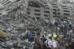 September 13, 2001--World Trade Center--Firefighters and rescue workers search for survivors through the rubble of the destroyed World Trade Center after terrorist attacks two days earlier on Tuesday September 11, 2001. (©2001 Kevin P. Coughlin/Independent Photojournalist)