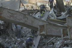 September 13, 2001--World Trade Center--Firefighters and rescue workers search for survivors in Lower Manhattan at Ground Zero of the destroyed World Trade Center after terrorist attacks two days earlier on Tuesday September 11, 2001. (©2001 Kevin P. Coughlin/Independent Photojournalist)