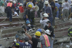 September 13, 2001--World Trade Center--Rescue workers search for survivors in Lower Manhattan at Ground Zero of the destroyed World Trade Center after terrorist attacks two days earlier on Tuesday September 11, 2001. (©2001 Kevin P. Coughlin/Independent Photojournalist)