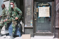 On 9/11/01, National Guradsman beside closed restaurant at Chambers Street and West Broadway.