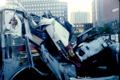 New York, Ground Zero 9/11/2001 
Aftermath of the attack on the World Trade Center. Workers searching the pile for survivors, Damaged Fire Trucks and Police vehicles
