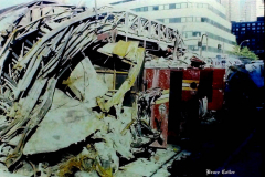 New York, Ground Zero 9/11/2001 
Aftermath of the attack on the World Trade Center. Workers searching the pile for survivors, Damaged Fire Trucks and Police vehicles