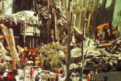 New York, Ground Zero 9/11/2001 
Aftermath of the attack on the World Trade Center. Workers searching the pile for survivors, Damaged Fire Trucks and Police vehicles