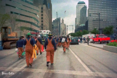 New York, Ground Zero 9/11/2001 
Aftermath of the attack on the World Trade Center. Workers searching the pile for survivors, Damaged Fire Trucks and Police vehicles