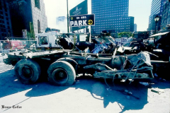 New York, Ground Zero 9/11/2001 
Aftermath of the attack on the World Trade Center. Workers searching the pile for survivors, Damaged Fire Trucks and Police vehicles