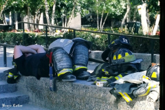 New York, Ground Zero 9/11/2001 
Aftermath of the attack on the World Trade Center. Workers searching the pile for survivors, Damaged Fire Trucks and Police vehicles