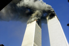 Smoke billows from the twin towers of the World Trade Center - the aftermath of a terrorist attack. A hijacked American Airlines Boeing 767, originating from Boston's Logan Airport, struck 1 World Trade Center (north tower) at 8:45 a.m. At 9:03 a.m., a United Airlines 767, also hijacked in Boston, crashed into 2 World Trade Center (south tower). Both towers later collapsed.

twin towers smoke