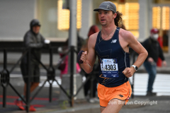 New York City Marathon 21 ÒAbbott Dash to the FinishÓ 11/6/21.  A sea of runners take to the streets of Manhattan for the 5K race.  The race is the warmup event one day before the NYC Marathon.  Runners start at the United Nations and run to the Marathon finish line in Central Park. Here the runners run up 6th Avenue past the Radio City Music Hall.  Copyright Jon Simon