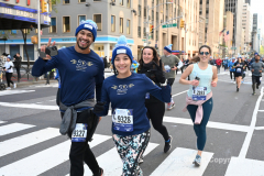 New York City Marathon 21 ÒAbbott Dash to the FinishÓ 11/6/21.  A sea of runners take to the streets of Manhattan for the 5K race.  The race is the warmup event one day before the NYC Marathon.  Runners start at the United Nations and run to the Marathon finish line in Central Park. Here the runners run up 6th Avenue past the Radio City Music Hall.  Copyright Jon Simon