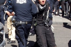Abolish I.C.E. protest at Duffy Square in Times Square N.Y.C. Protestors blocked the streets with bicycles and made a human wall with them interlocking arms to deny vehicle traffic to move along Broadway. N.Y.P.D moved in quickly and arrested the protestors about 100 of them were handcuffed and taken into custody.