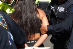Abolish I.C.E. protest at Duffy Square in Times Square N.Y.C. Protestors blocked the streets with bicycles and made a human wall with them interlocking arms to deny vehicle traffic to move along Broadway. N.Y.P.D moved in quickly and arrested the protestors about 100 of them were handcuffed and taken into custody.