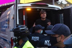 Abolish I.C.E. protest at Duffy Square in Times Square N.Y.C. Protestors blocked the streets with bicycles and made a human wall with them interlocking arms to deny vehicle traffic to move along Broadway. N.Y.P.D moved in quickly and arrested the protestors about 100 of them were handcuffed and taken into custody.