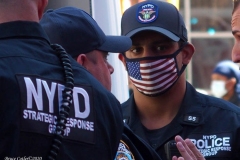 Abolish I.C.E. protest at Duffy Square in Times Square N.Y.C. Protestors blocked the streets with bicycles and made a human wall with them interlocking arms to deny vehicle traffic to move along Broadway. N.Y.P.D moved in quickly and arrested the protestors about 100 of them were handcuffed and taken into custody.