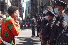 Abolish I.C.E. protest at Duffy Square in Times Square N.Y.C. Protestors blocked the streets with bicycles and made a human wall with them interlocking arms to deny vehicle traffic to move along Broadway. N.Y.P.D moved in quickly and arrested the protestors about 100 of them were handcuffed and taken into custody.