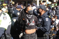 Abolish I.C.E. protest at Duffy Square in Times Square N.Y.C. Protestors blocked the streets with bicycles and made a human wall with them interlocking arms to deny vehicle traffic to move along Broadway. N.Y.P.D moved in quickly and arrested the protestors about 100 of them were handcuffed and taken into custody.