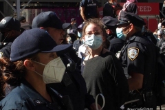 Abolish I.C.E. protest at Duffy Square in Times Square N.Y.C. Protestors blocked the streets with bicycles and made a human wall with them interlocking arms to deny vehicle traffic to move along Broadway. N.Y.P.D moved in quickly and arrested the protestors about 100 of them were handcuffed and taken into custody.