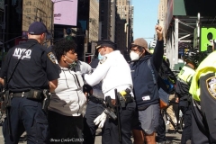 Abolish I.C.E. protest at Duffy Square in Times Square N.Y.C. Protestors blocked the streets with bicycles and made a human wall with them interlocking arms to deny vehicle traffic to move along Broadway. N.Y.P.D moved in quickly and arrested the protestors about 100 of them were handcuffed and taken into custody.