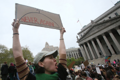 A pro choice protestor in NYC where hundreds of demonstrators gathered in Foley Square in response to the document that leaked from the US Supreme Court that indicates that Roe vs Wade might be overturned.,