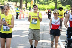 June 26, 2022: The 2022 Achilles Hope and Possibility 4 mile run, 1 mile walk and Stage 1 RNYRR dashes are held in Central Park in New York City.