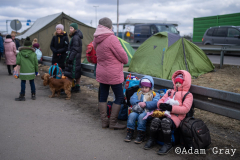 Ukrainian refugees make their way West from Chelm, Poland, after crossing the border