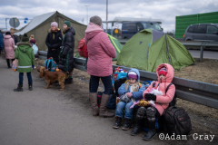 Ukrainian refugees make their way West from Chelm, Poland, after crossing the border