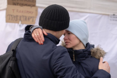 Victor Titarchuk embraced his wife Anna after crossing the Polish border. He was to return to Ternopil to fight the Russian invasion. The family had already fled Donetsk in 2014, this is their second war. He is also leaving behind his daughter Milana who has special needs