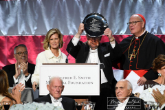 The 76th Alfred E Smith Dinner
Javits Center Expansion
429 11th Avenue
New York, NY
Thursday, October 21, 2021
For Credit:  Mary DiBiase Blaich

The Honorable Condoleezza Rice, 66th Secretary of State of the United States, was this year’s Keynote Speaker for the 76th Annual Alfred E. Smith Memorial Foundation Dinner,  The dinner was held on Thursday, October 21, 2021 at the Javits Center Expansion located at 429 11th Ave, New York, NY 10001 at 7:00PM.
Secretary Rice shared the dais with Timothy Cardinal Dolan, Archbishop of New York. This year’s  “Happy Warrior” award recipient was Mr. Frank Bennack, Jr who received his award from Mary Callahan Erdos, Vice-Chair of the Alfred E Smith Foundation. The evening also featured a prerecorded video by President George W. Bush, a former Keynote Speaker who wore a T-shirt with a tuxedo print on the front.