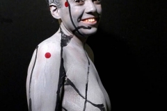 Andy Golub  Artist paints models for a living mural in his art space.
