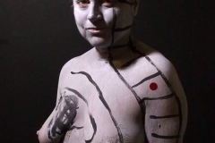 Andy Golub  Artist paints models for a living mural in his art space.