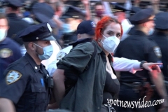 A Woman gets arrested during struggle with NYPD at the Barclay’s protest.