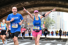 NYC Marathon runners pass under the 59th St Bridge and up 1st Avenue during the 2021 NYC Marathon.