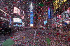 Confetti fills an almost empty Time Square due to Covid restrictions in New York City as the Waterford Crystal Ball falls to ring in the New Year on 01 January 2021