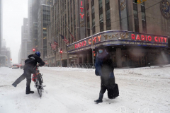 People on 6th Avenue during the first major snow storm of the 2021 season. Mayor Bill de Blasio called for a state of emergency and only essential workers were working. Some areas got over 2 feet of snow on 01 February 2021