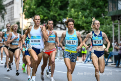 Runners take to 5th Avenue 9/12/21 as they run the mile race down 5th Ave.