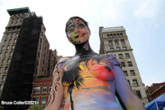New York 8th annual Body Painting Day.cover 50 artists and models came out to showcase there talent and paint living canvasses after the painting portion of the event they all walked down 5th ave to Washington Square park to pose for photographs and then boarded a Double Decker bus to Bushwick Brooklyn to celebrate.