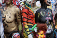 New York 8th annual Body Painting Day.cover 50 artists and models came out to showcase there talent and paint living canvasses after the painting portion of the event they all walked down 5th ave to Washington Square park to pose for photographs and then boarded a Double Decker bus to Bushwick Brooklyn to celebrate.