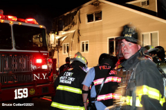New York,  New York City Fire Department response  to a fire in the Gerritsen Beach neighborhood of Brooklyn when the arrived the quickly learned that a house was fully engulfed and it spread to an adjourning house. The fire Marshal's will determine the cause of the fire.