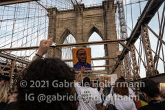 Protesters cross the Brooklyn Bridge in New York City, NY, on the one year anniversary of George Floyd's death on May 25, 2021. (Photo by Gabriele Holtermann for amNY)