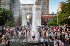 Dyke protest march participants cool-off in the Washington Square Park fountain in New York City on June 26, 2021. Highlighting the diversity of the dyke community, hundreds took part in a protest march from Bryant to Washington Square Park on June 26, 2021. (Photo by Gabriele Holtermann/Sipa USA)