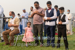 Members of the Islamic Society of Bay Ridge join in prayer at the Eid-Al-Adha celebration in Bensonhurst, Brooklyn, NY, on July 20, 2021. (Photo by Gabriele Holtermann for Brooklyn Paper)
