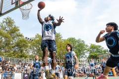 The Blue Chips basketball teams from the 111th (blue jersey) and 17th (white jersey) NYPD precincts compete for the championship title at Dyckmann Park in New York, NY, on Aug. 17, 2021. (Photo by Gabriele Holtermann for Queens Courier)