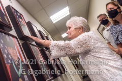 Janet Kloepfer, mother of NYPD  P.O. Ronald Kloepfer, touches the painting of her son at PBA HQ in New York, NY, on Sept. 7, 2021. (Photo by Gabriele Holtermann for amNY)