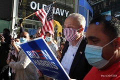 Celebrations breakout all over New York City with the news of  Biden/ Harris  Presidential victory.United States Senator Charles Schumer holds Biden / Harris sign while walking thru Times Square