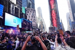 People gather in Times Square to celebrate the presidential election results that Joe Biden has defeated incumbent President Donald Trump.