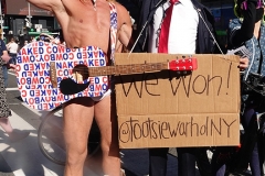 Artist and Activist Tootsie Warhol and The Naked Cowboy celebrate Joe Biden as the next President of the United States of America in Times Square